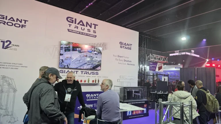 Visitors talking at the Giant Truss stand, ISE - Spain